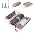 Portable LED camping lantern in off white or dark grey colour with battery compartment and button switch