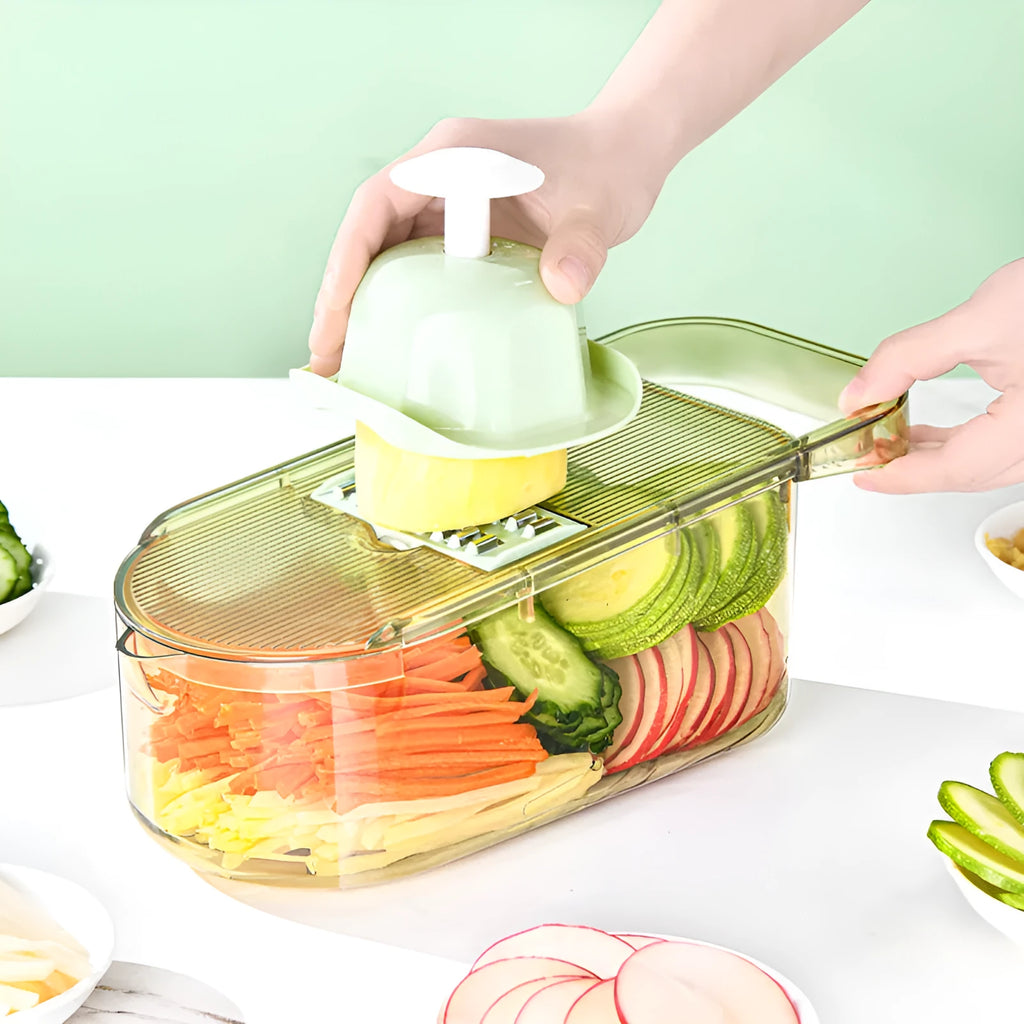 Transparent green multifunction vegetable cutter with six stainless steel blade heads and a large capacity box