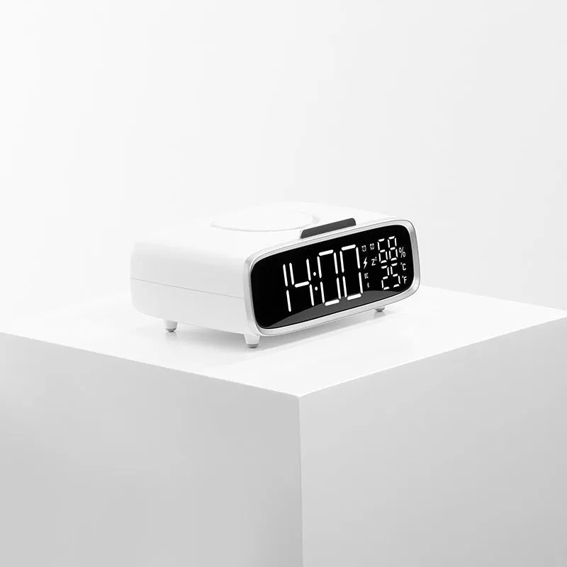 White wireless charger with Bluetooth speaker and night lamp functions showing Qi charging surface