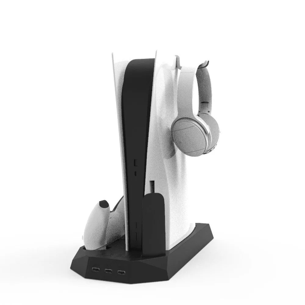 White PS5 charging station holding a console, two controllers, and a headset.