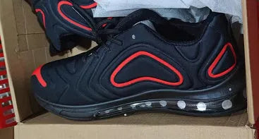 Men's black casual shoes with air cushion design, lace-up front, and thick sole for outdoor running