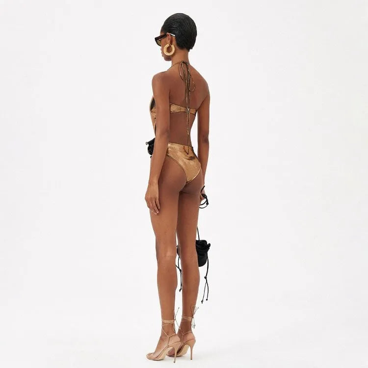 Gold handmade halter one-piece swimsuit with hollow-out detail on the front.