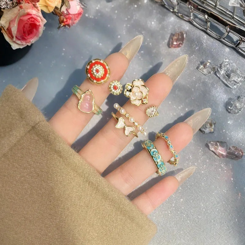 Adjustable vintage copper ring with gourd motif and inlaid zircon stones in New Chinese style.