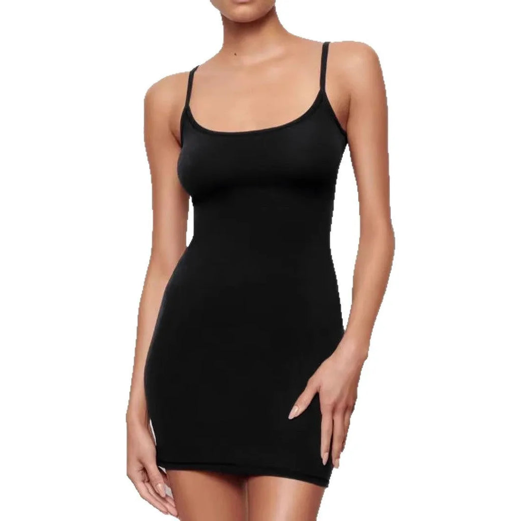 Black slim-fit sling sheath dress on a mannequin, showing sleeveless design and mid-waist.
