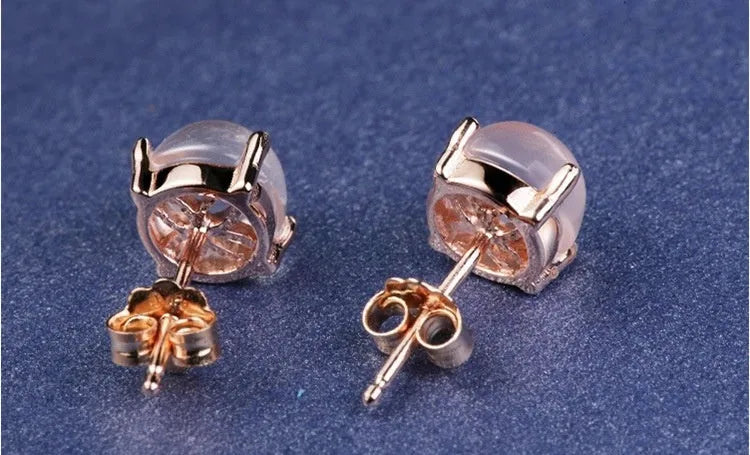 Women's rose gold drop shape stud earrings with synthetic ross quartz crystal inlay, Korean-style minimalist design