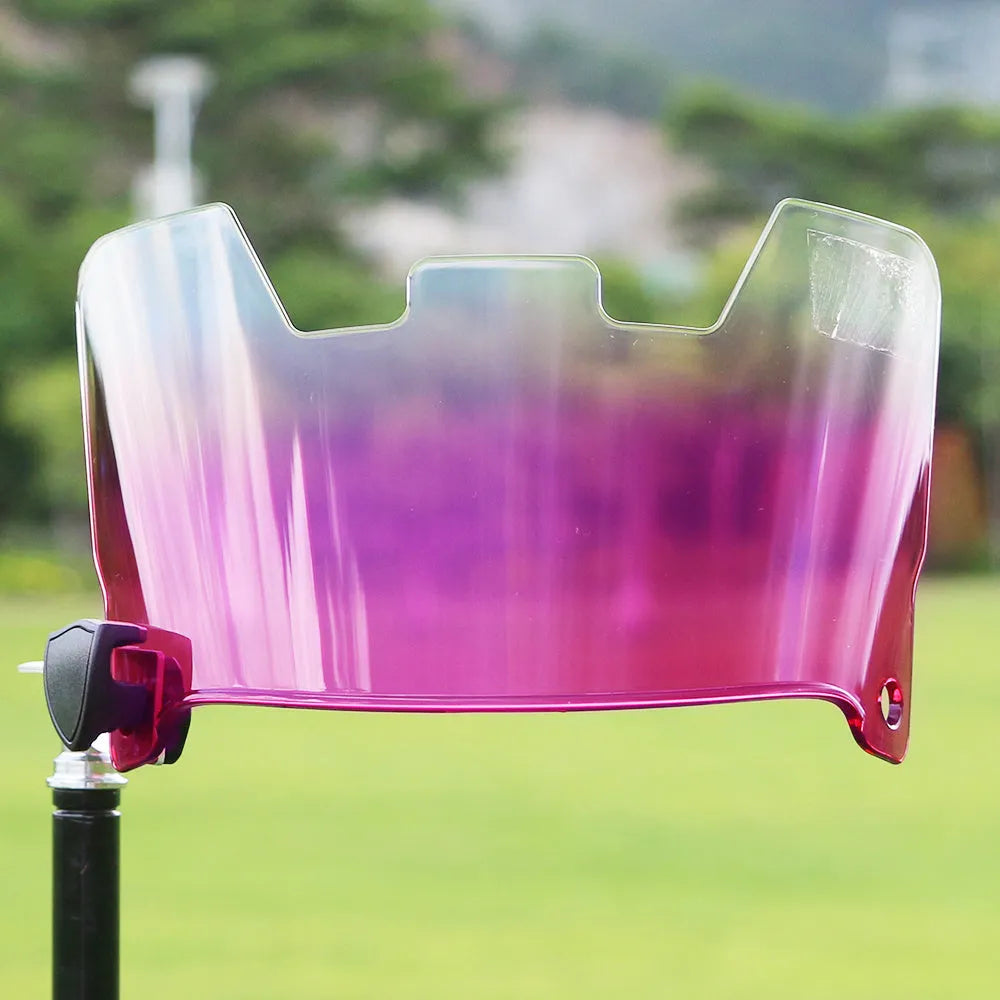 Multicolour American-style rugby helmet goggles shown attached to a helmet for impact protection.