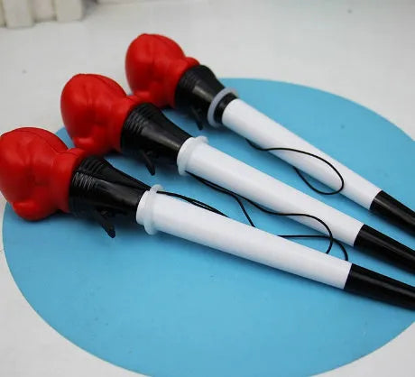 Four black ink ballpoint pens with pressure-click mechanisms and 0.7mm bullet tips