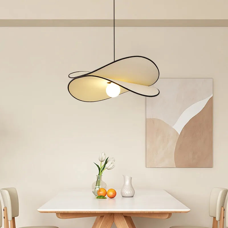 French style artistic fabric chandelier pendant light with a textured shade in a modern bedroom setting.