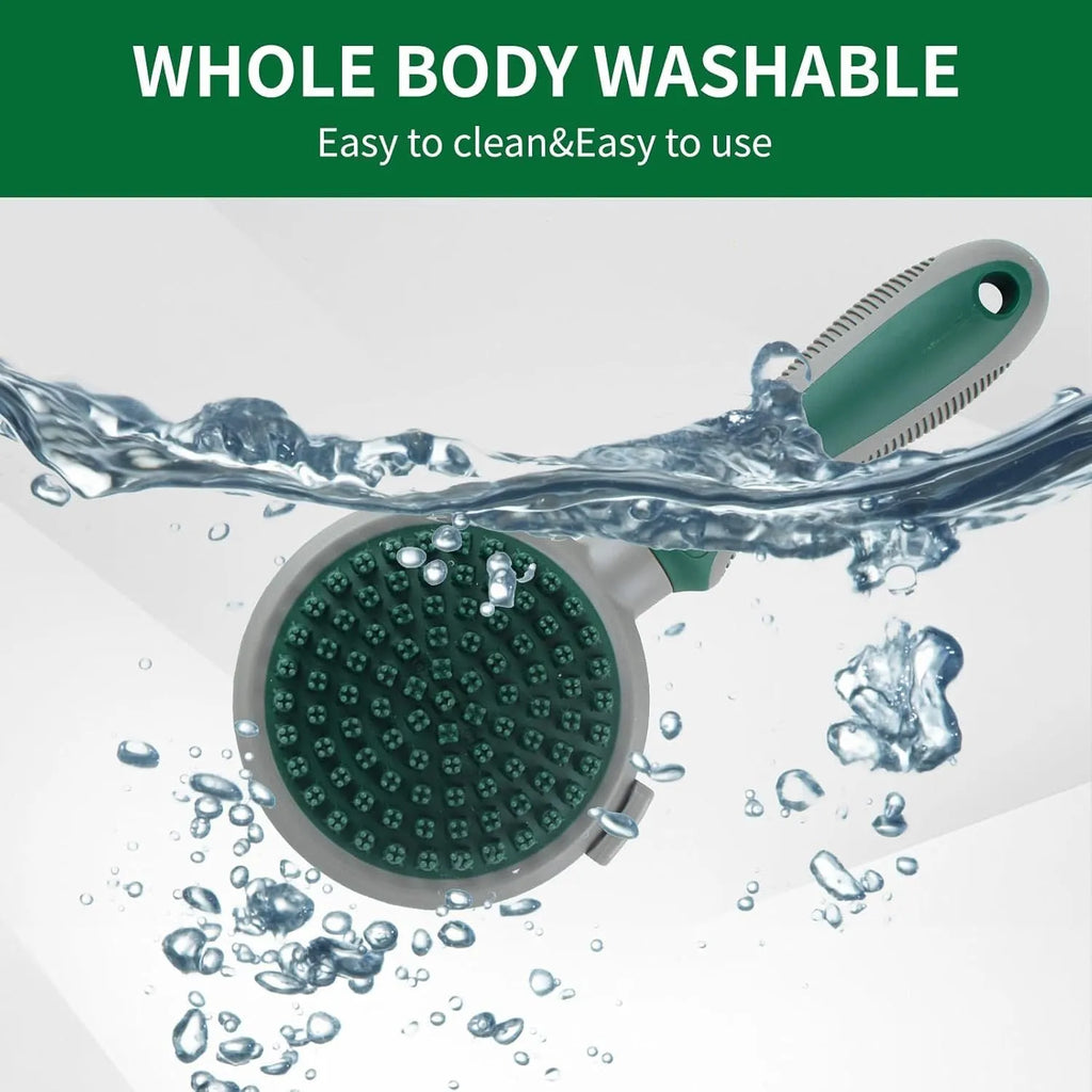 Green and pink dual-sided pet grooming brush with silicone massager and retractable slicker brush.
