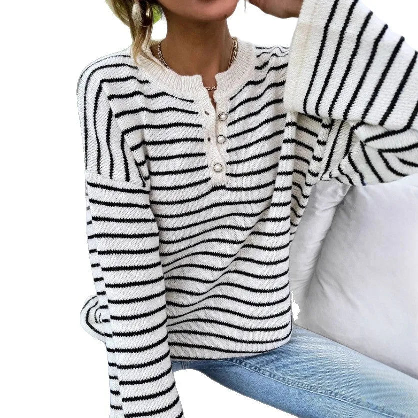 Black striped women's long sleeve top with drop shoulder design and button front
