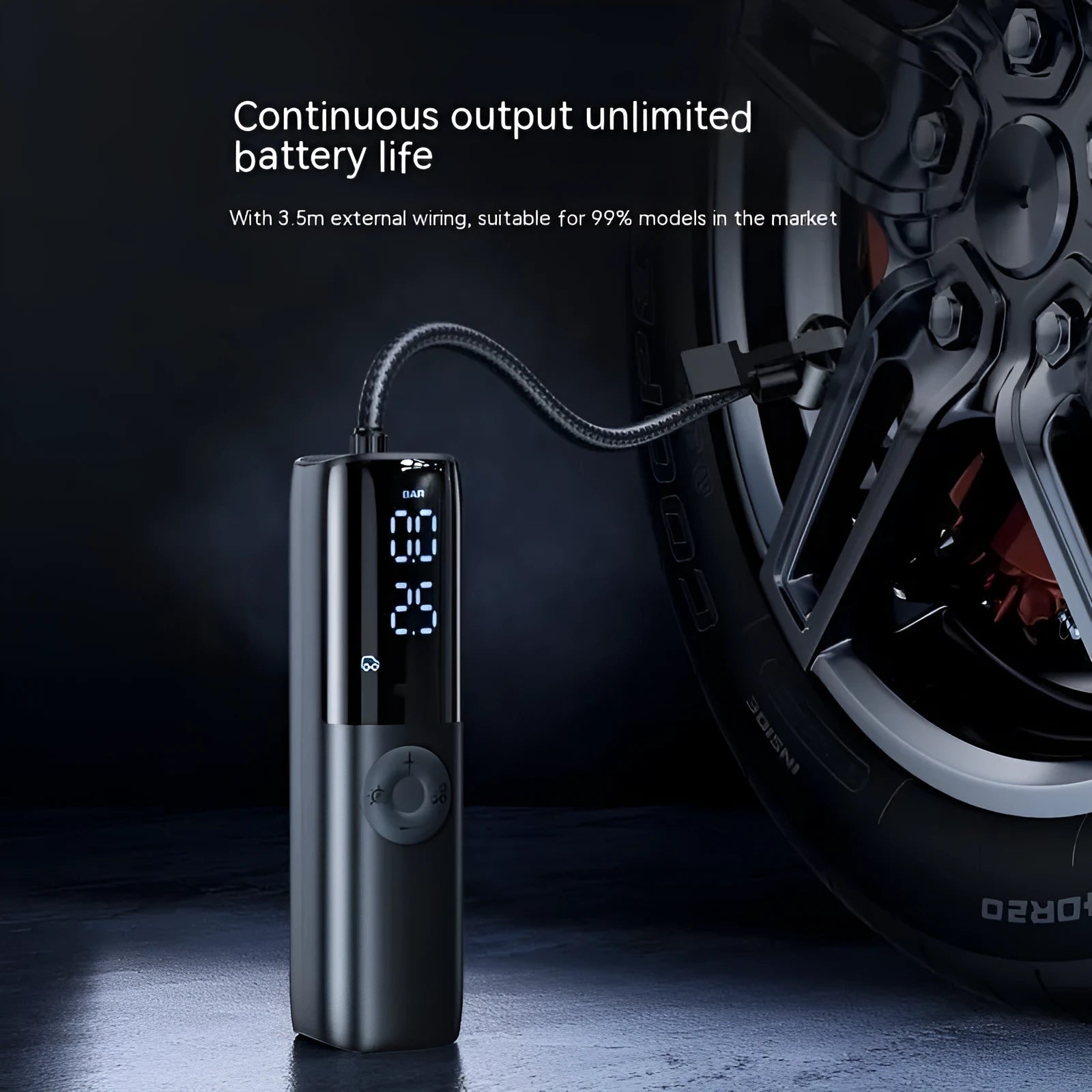 Black portable electric car air pump with tyre pressure gauge and inflation tube