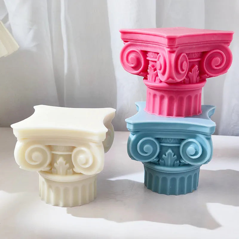 A flexible silicone mould in the shape of an irregular Roman pillar for making candles, chocolate, and crafts.