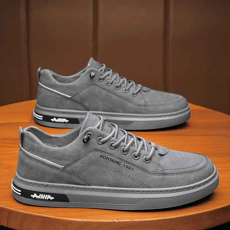 Men's black low-top casual shoes with round toe and non-slip rubber sole.