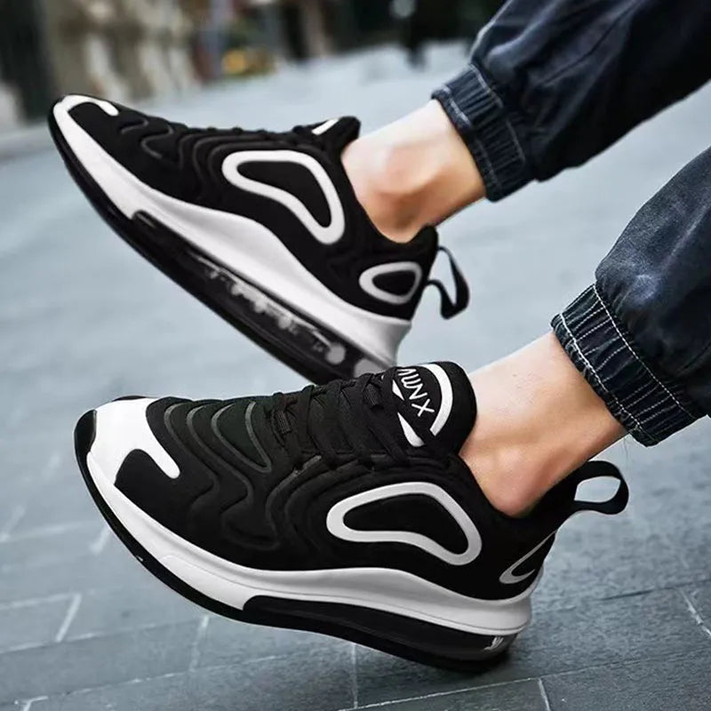 Men's black casual shoes with air cushion design, lace-up front, and thick sole for outdoor running