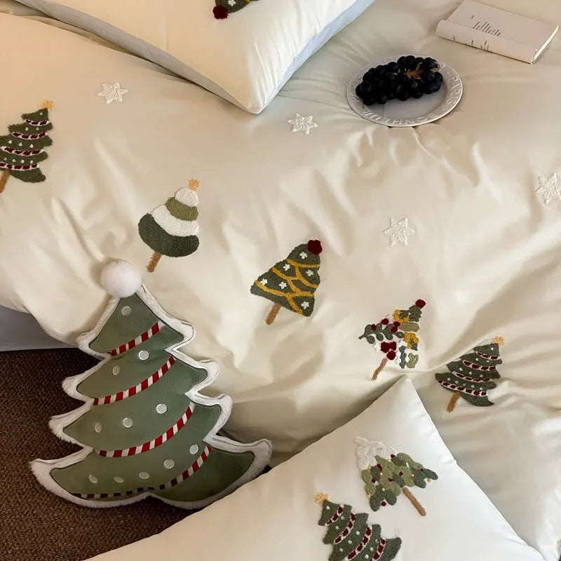 Pure cotton bedding set with Christmas tree embroidery showing duvet cover, sheet, and pillowcases