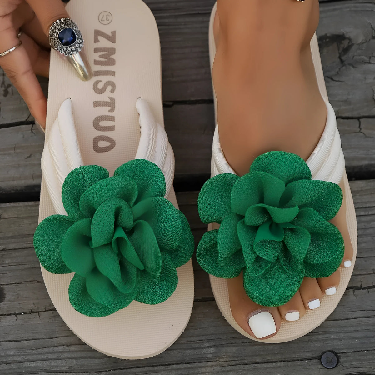 Green plus size floral slippers with round toe and PU sole on a white background.