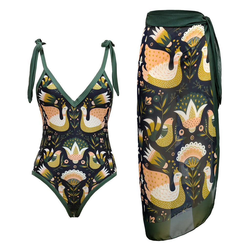Women's solid colour one-piece swimsuit with thin spaghetti straps and a matching detachable skirt.
