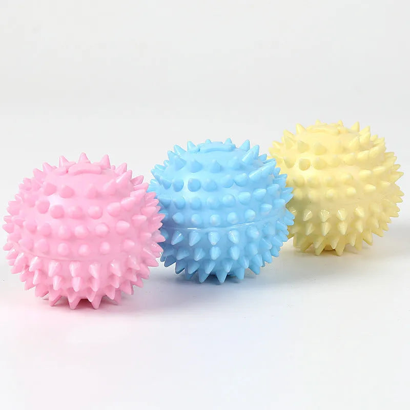 Blue TPR pet chewing ball with footprint texture and tooth-cleaning ridges measuring 6cm diameter