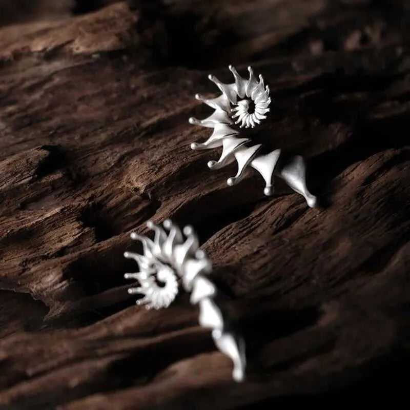 Matte finish alloy conch stud earrings with three-dimensional design and irregular shape