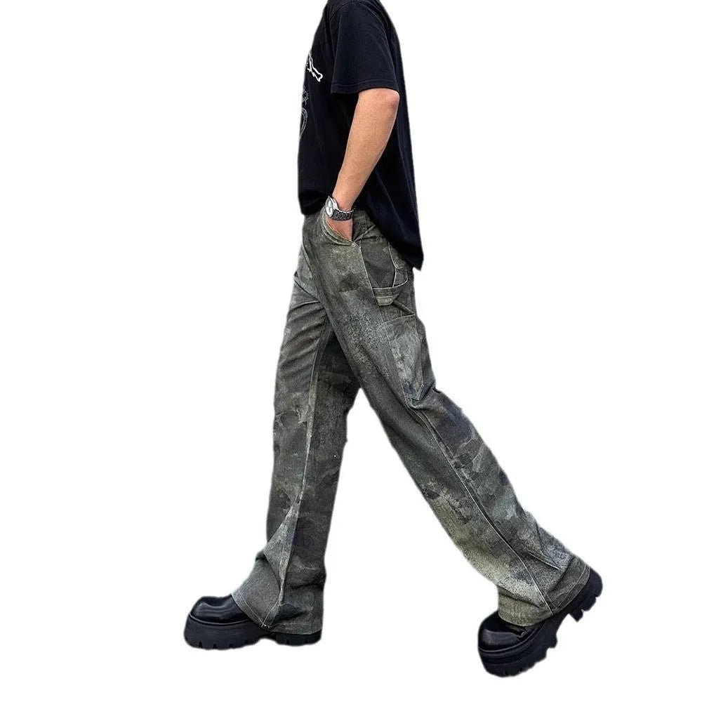Men's straight-leg jeans with a retro digital camouflage pattern on blue denim.