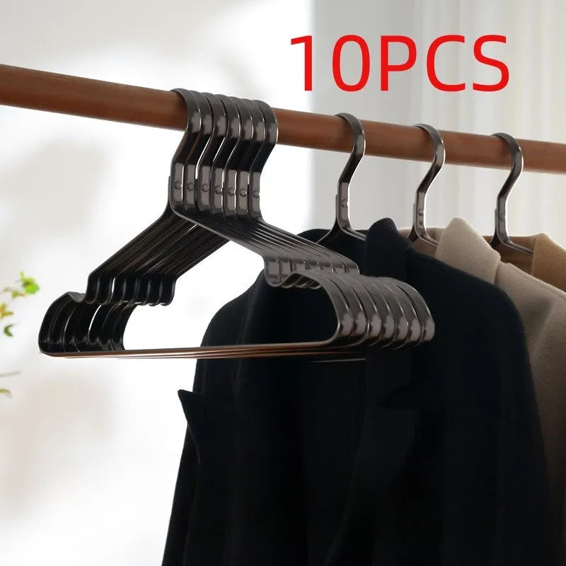 Elegant black modern simplicity clothes hanger with anti-slip surface.