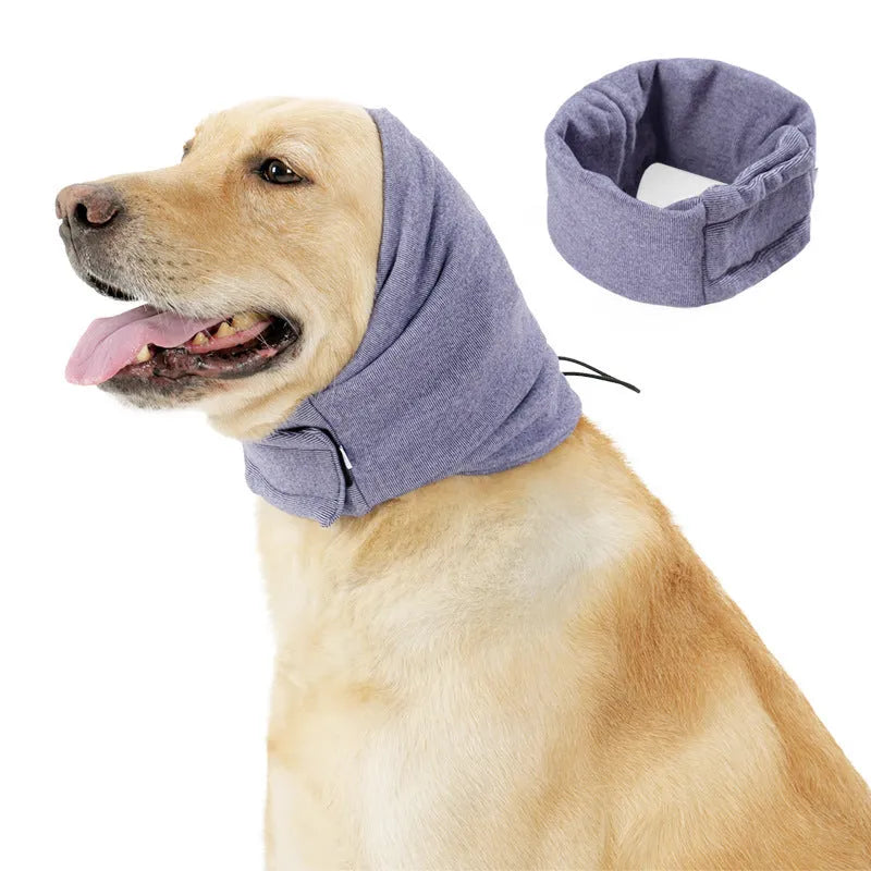 Dog wearing black calming hoodie covering ears with hair protection and scarf function
