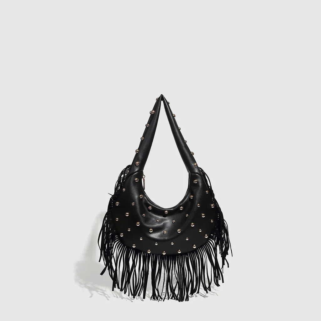 Retro black shoulder handbag with tassel detail and internal mobile phone pocket.