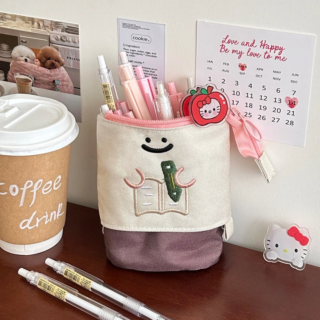 Korean style cartoon collapsible pencil case in Oxford fabric measuring 17cm by 14cm