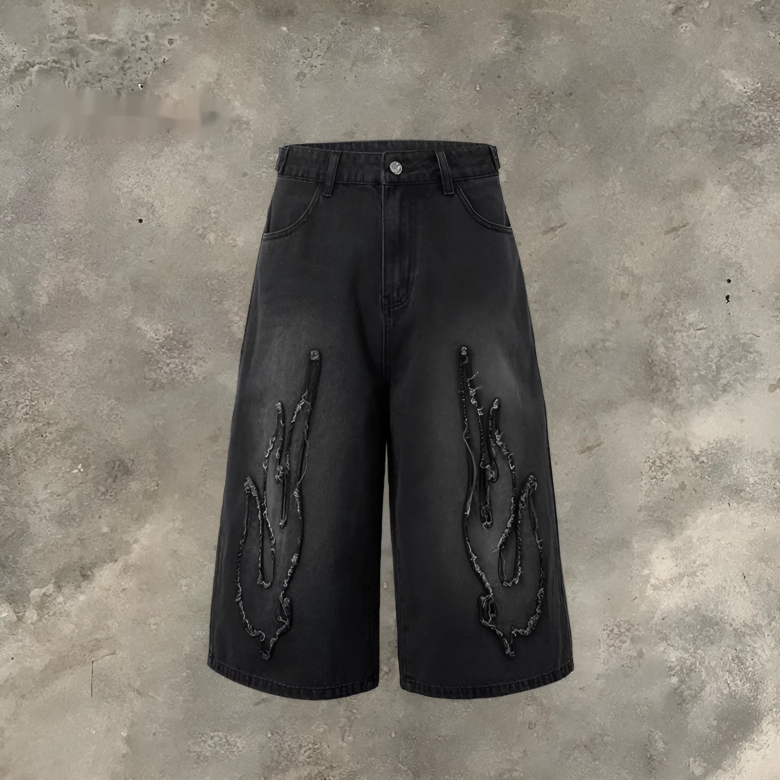 Men's black cropped denim shorts with flame embroidery patch and straight-leg cut