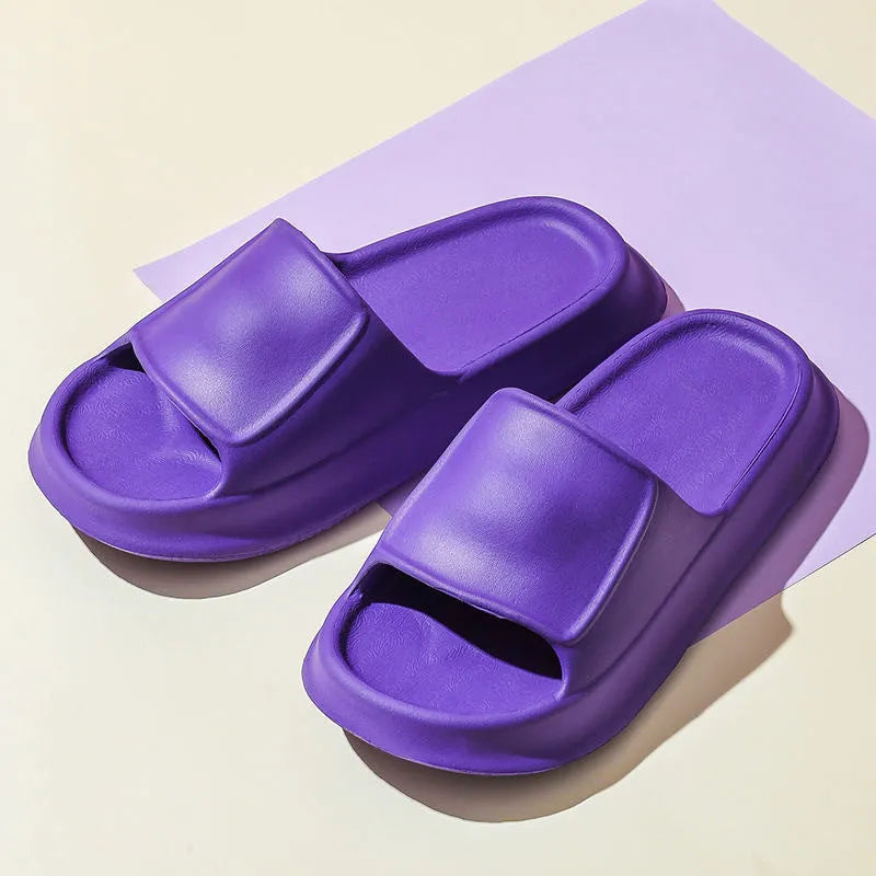 Thick-soled EVA flip-flop slippers in various colours on a white background.