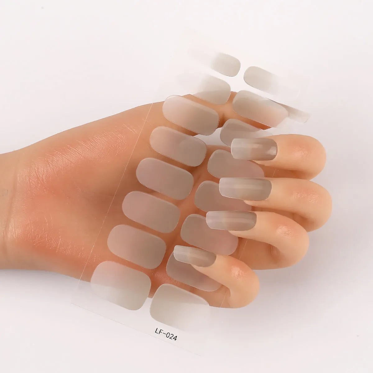 Full coverage nail art stickers sheet with 16 designs including cross, rose, tulip, and cartoon patterns.