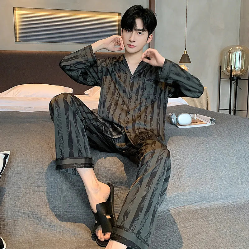 Men's black striped Ice Silk V-neck pyjama set with long sleeves and thin trousers.