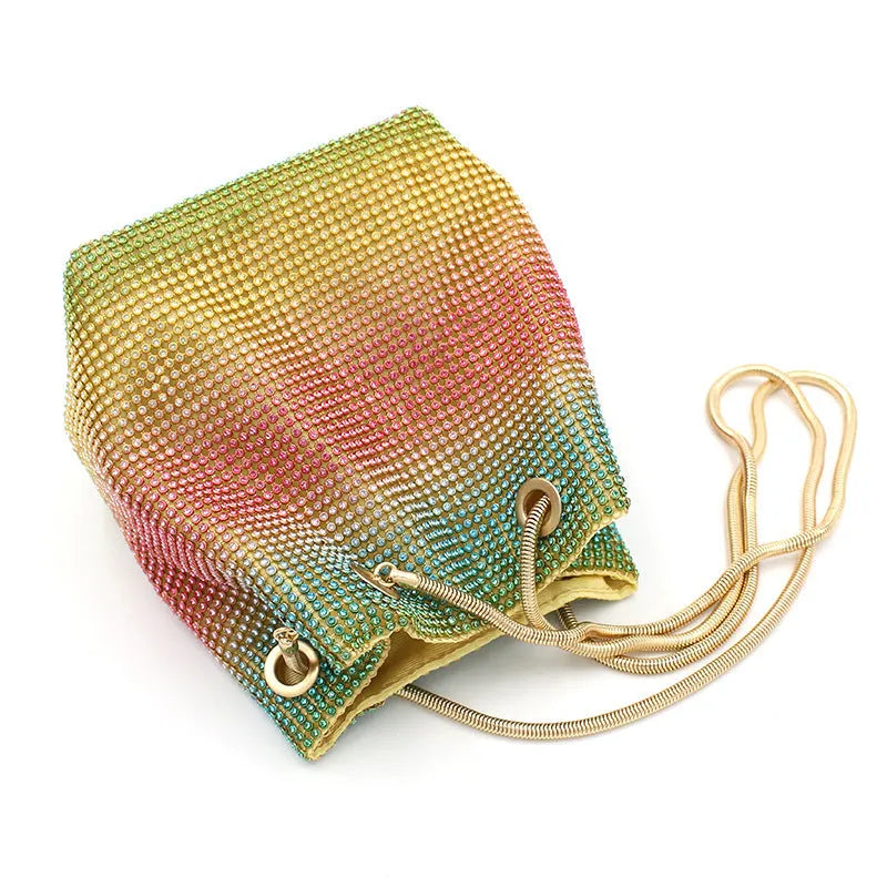 Soft multicolour rhinestone bucket bag with drawstring closure for evening wear.