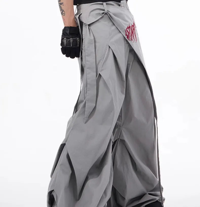 Boy modelling black wide-leg Korean-style casual trousers.