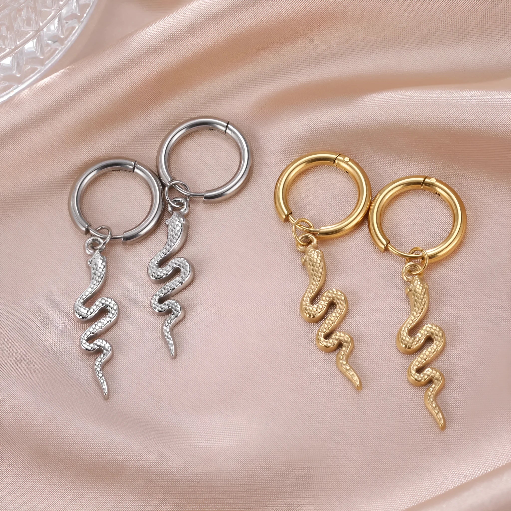 Snake-shaped vintage clip-on earrings in gold or steel colour on stainless steel