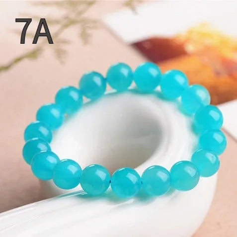 Natural Amazonite crystal bracelet with scattered polished beads in ice colour variations