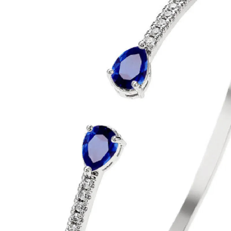 Copper bracelet with multi-zircon inlay stones in simple style, shown in white and blue colour options