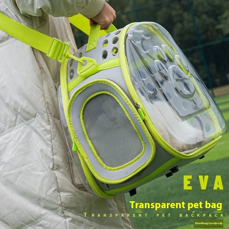 A large transparent hard-shell cat backpack in grass green, shown with dimensions for a pet up to 9kg.