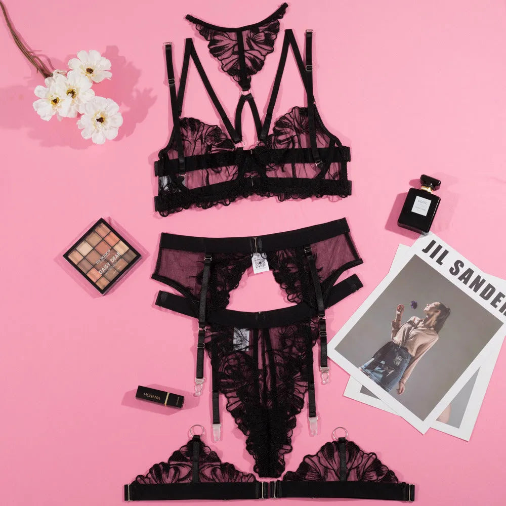 Black women's mesh bra with embroidery detail and a three-point strap back design.