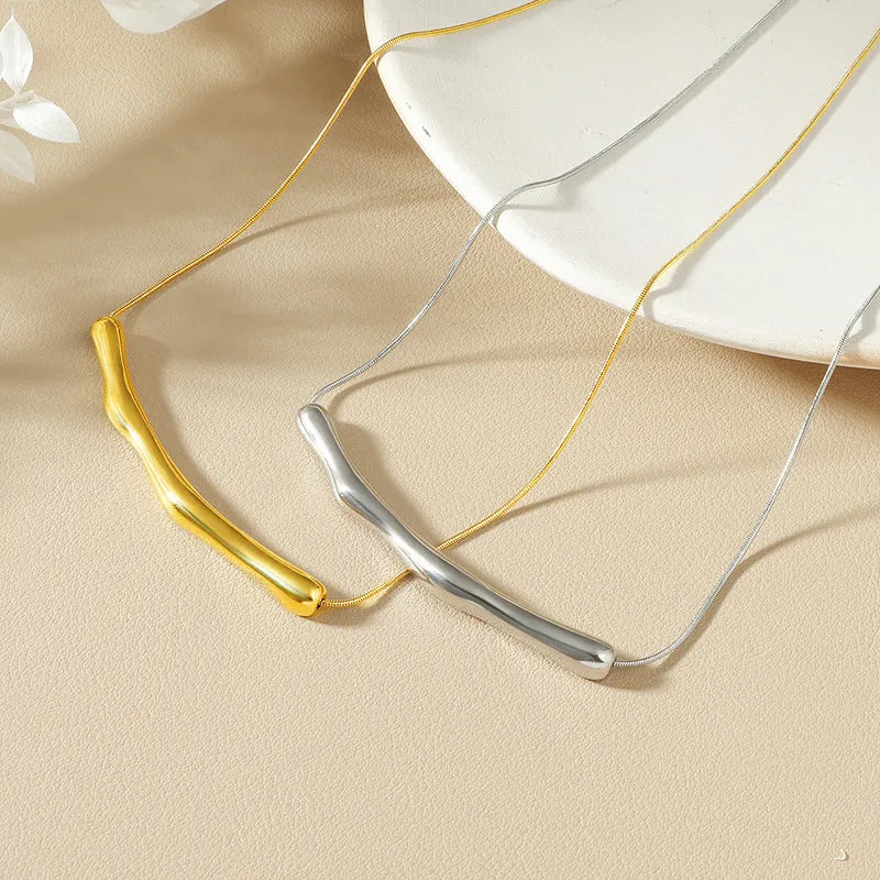 Women's titanium steel necklace with irregular pleated texture in gold electroplated finish