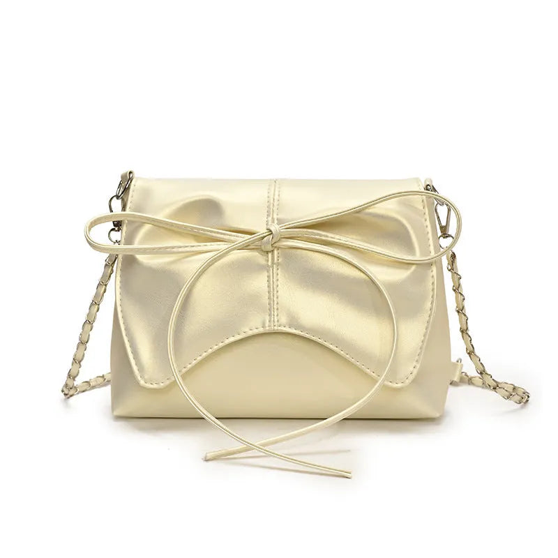 Women's black underarm crossbody bag with horizontal square design and crossbody strap