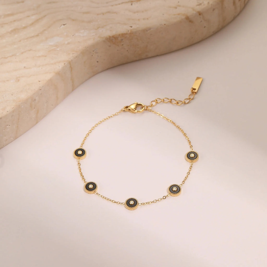 Geometric design women's jewellery set with bracelet and necklace in gold-plated stainless steel