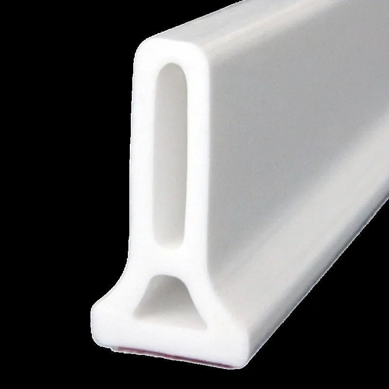 Flexible silicone bathroom water blocking strip in white, black, and grey colours showing 30mm width dimension