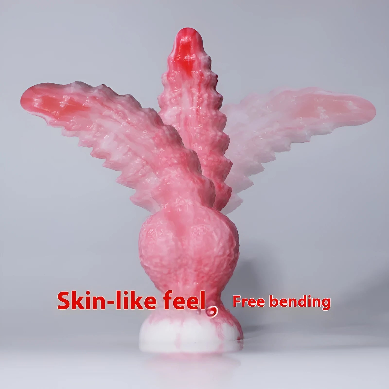 Pink penis-shaped silicone masturbation device for women
