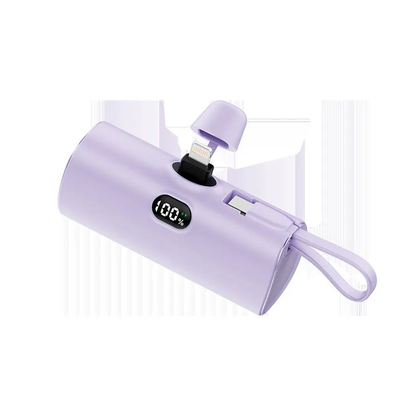Capsule-shaped power bank with digital display and built-in AC plug in multiple colour options