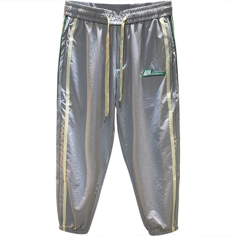 Men's black and grey cotton harem-style casual trousers with mid waist design