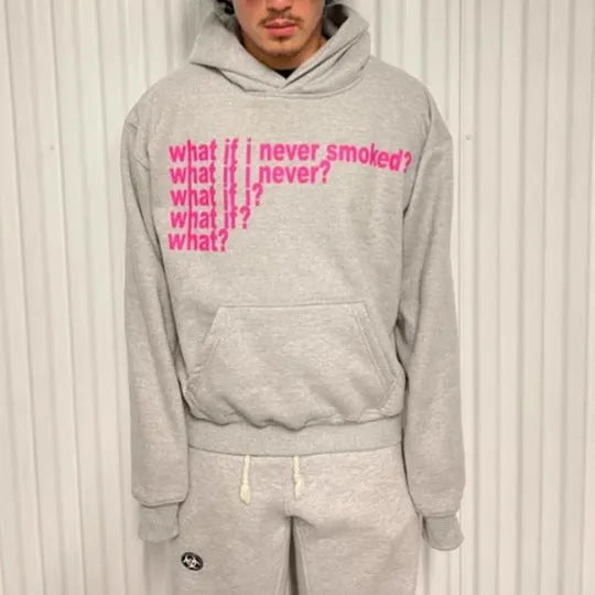 Black hooded sweater with white letter print design, showing pullover style with regular sleeves