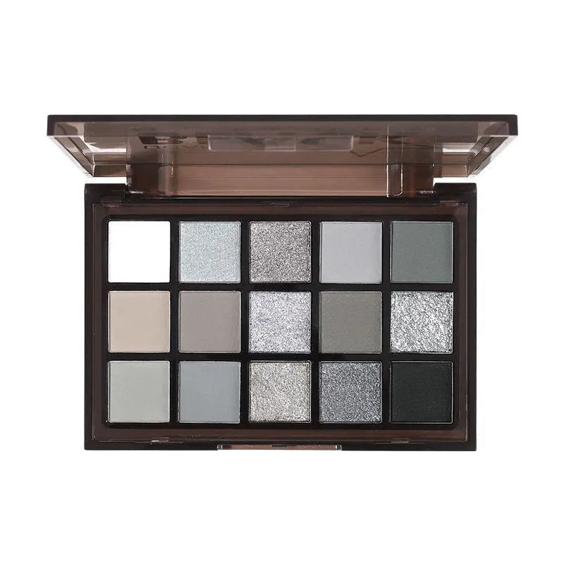15-colour cartoon style eyeshadow palette showing brown, blue, and dark smoky matte and shimmer shades.
