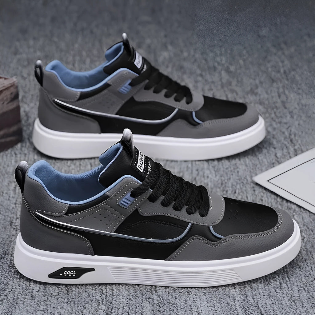 Men's canvas board shoes in black with mesh lining and leather stitching details