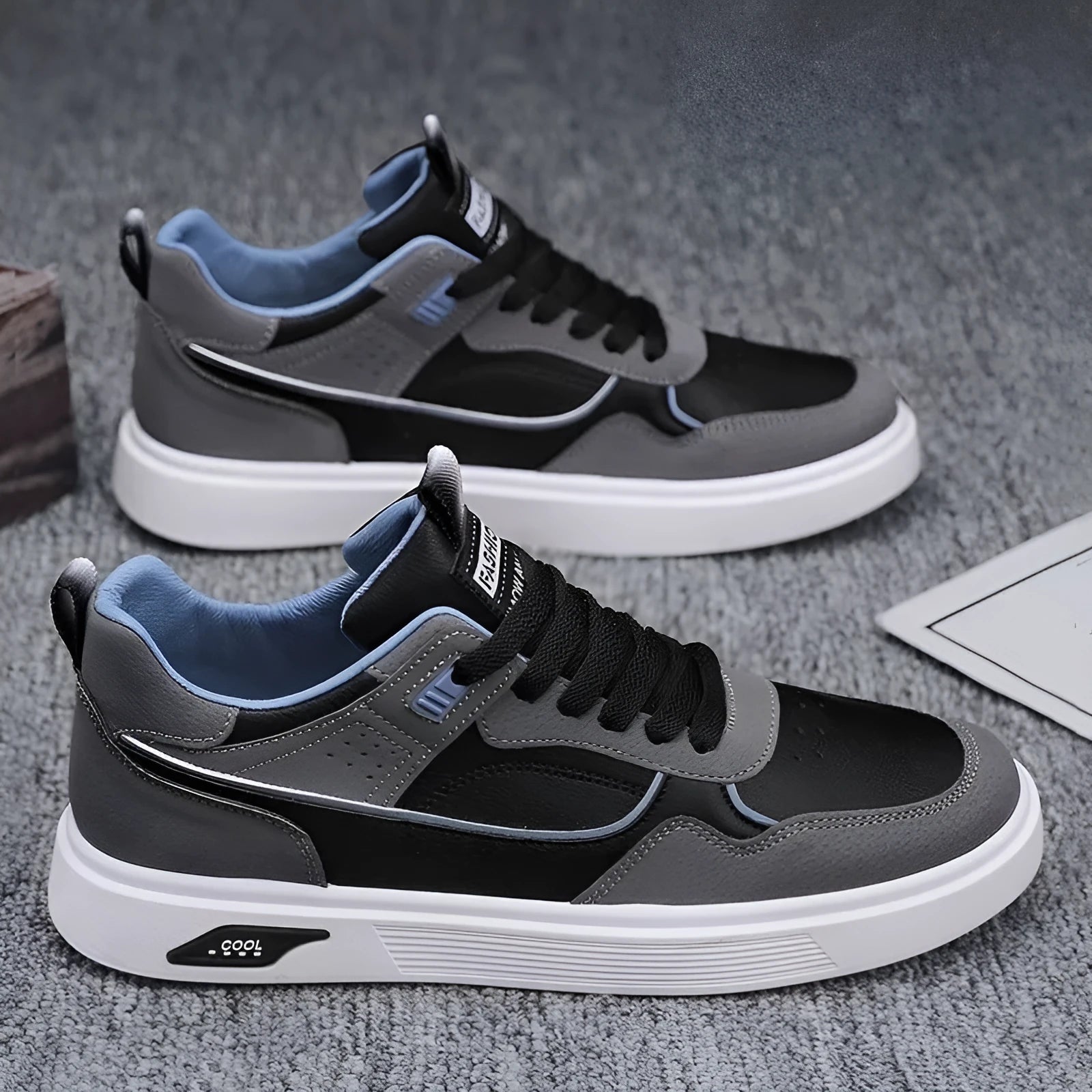 Men's canvas board shoes in black with mesh lining and leather stitching details